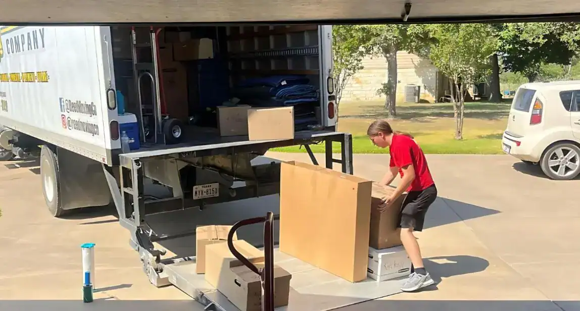 Local movers in Whitney, TX loading a truck