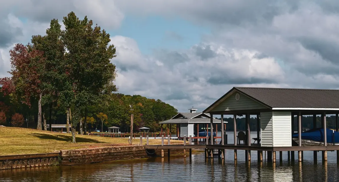 Lake home with a covered boat dock